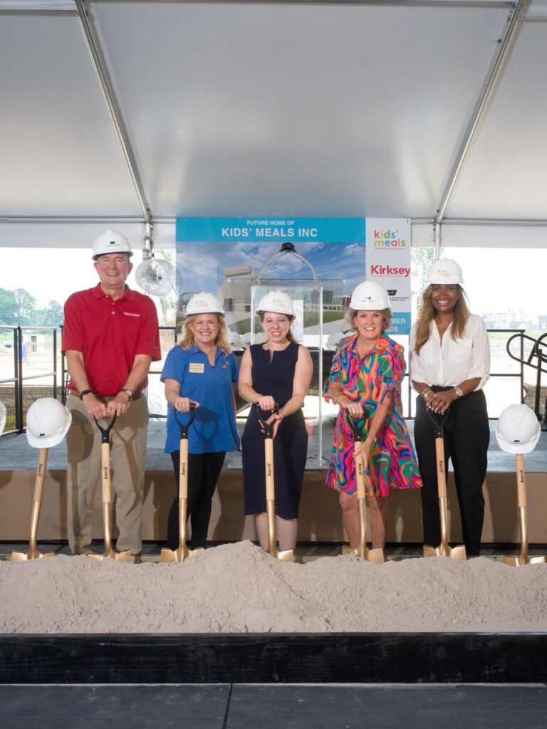 Pictured left to right are Earl Hesterberg, Building Hope Campaign Chair; Beth Harp, Kids’ Meals CEO; Amy Peck, Vice Mayor Pro-Tem; Twila Carter, City Council Member; Letitia Plummer, City Council Member all holding shovels and wearing hard hats at the Groundbreaking Ceremony of the future headquarters of Kids' Meals